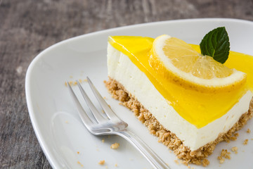 Lemon pie on wooden background
