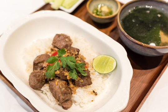 fried diced lamb with garlic and black pepper served with jasmine rice and clear soup