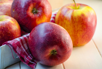 Fototapeta na wymiar Big red apple on the table