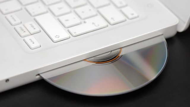 Ejecting dvd from a white notebook
