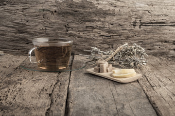 sage tea on wooden table