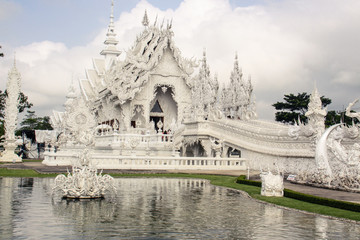 Wat Rong Khun, perhaps better known to foreigners as the White Temple Buddhist temple in Chiang Rai Province, Thailand.