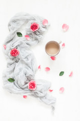Fototapeta na wymiar Composition with coffee and rose flowers. Flat lay, top view