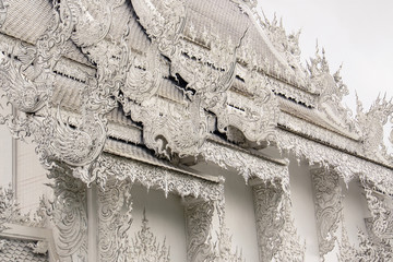 Wat Rong Khun, perhaps better known to foreigners as the White Temple Buddhist temple in Chiang Rai Province, Thailand.
