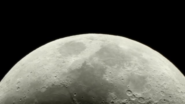high magnification of the moon shot through a schmidt-cassegrain telescope