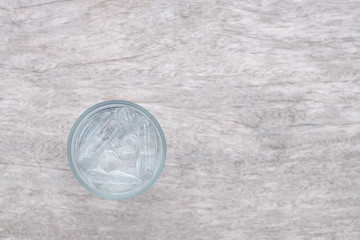 Top view of Water with ice in the glass cup.