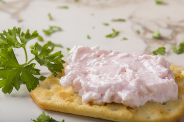 Thin crispy crackers with carp roe salad