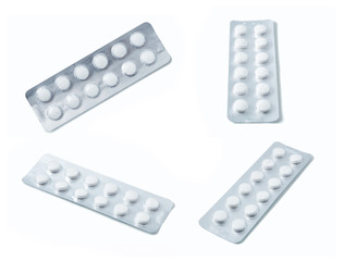 Aluminium blister pack of pills. The capsules are packaged in blisters, isolated on a white background. Disease. Flu. Medications.