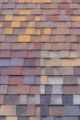 Fototapeta premium multi-colored bitumen shingles a sample of the product advertising