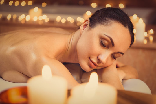 Relaxed woman resting at spa