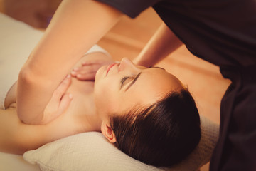 Obraz na płótnie Canvas Skillful beautician massaging female body