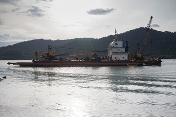 Sand replenishment ship on shore for land reclamation