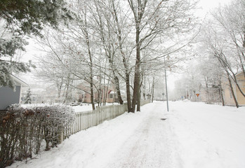 Old district of wooden houses on gloomy winter day
