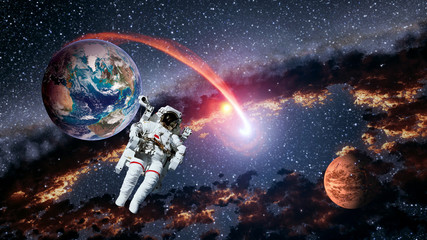 Obraz na płótnie Canvas Astronaut planet Earth Mars spaceman launch outer space galaxy universe. Elements of this image furnished by NASA.