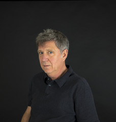 portrait  of positive looking mature man