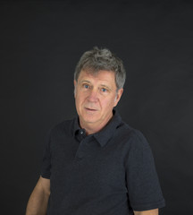 portrait  of positive looking mature man
