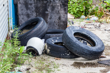 Old tire indicating breeding ground for mosquito