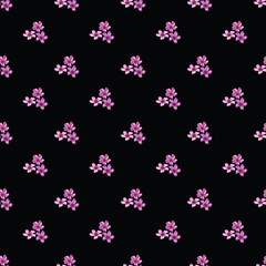 Seamless floral pattern with groups of violet flowers on black background