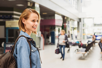 Happy girl preparing for journey