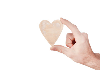 Obraz premium Hand holding wood heart 