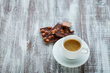 chocolate with coffee on a wooden white table