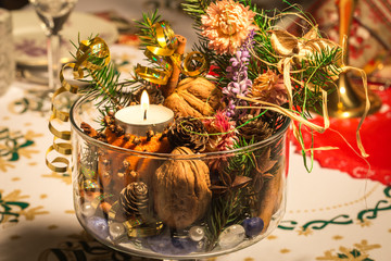 decorations on christmas table in glass jar