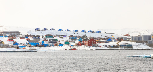 Aasiaat city center infrastructure, view from the sea, North Gre © vadim.nefedov
