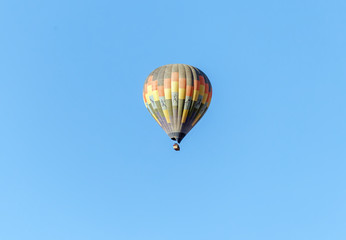 Hot air balloon flies over the Sossusvlei plato of Namib Naukluft National Park - Namibia, South Africa