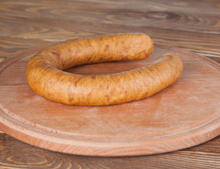 Ring sausage on wood desk