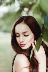 Beautiful young girl in black dress with long hair, super cute a