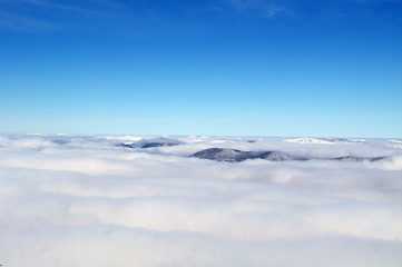 Fototapeta na wymiar Hills in the clouds
