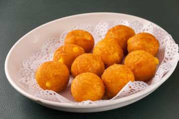 Khanom kai nok krata or deep-fried sweet potato balls