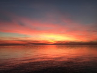 Fototapeta na wymiar Incredibly colorful sunset in Trieste Italy