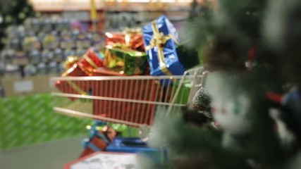 Shopping carts full of Christmas gifts. Christmas and shopping concept - Powered by Adobe