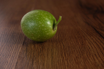 The young walnut on wood