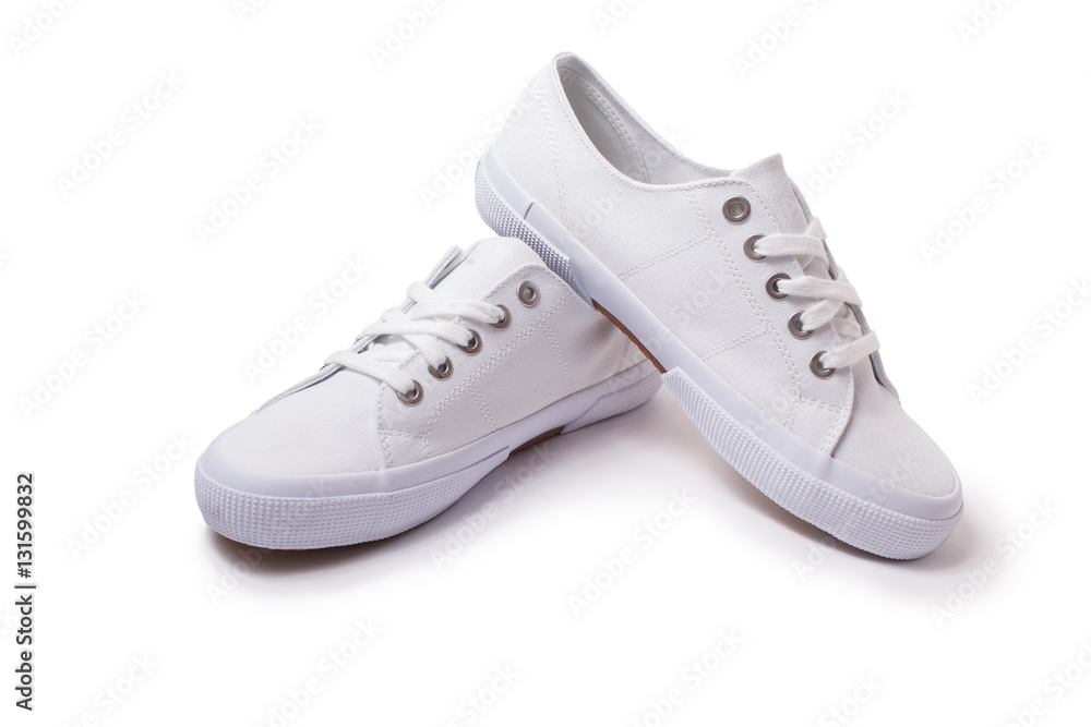 Wall mural casual sneakers on white background