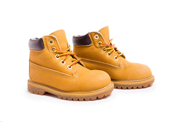 Yellow boots isolated on white background