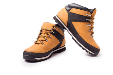Yellow boots isolated on white background