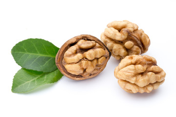 Walnut and walnut kernel isolated on the white background.