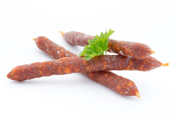 Smoked sausage salami isolated on a white background.