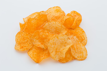 Crisps with paprica on a white background.