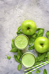 Spinach apple smoothie in a mason jar.Top view with copy space.