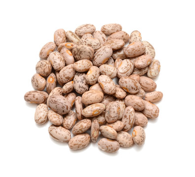 healthy brown pinto beans on white background