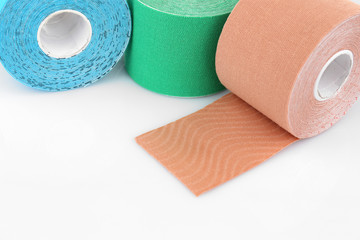 Special physio tape rolls on white background, closeup