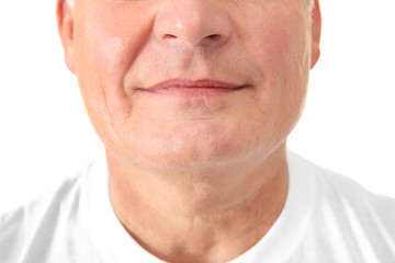 Senior handsome man on white background