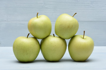 Set of pyramid green apples