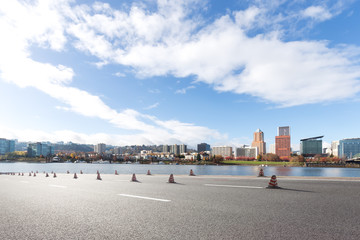 cityscape and skyline of portland from empty road