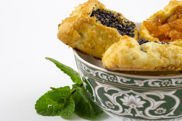 Hamantaschen with poppy seed and sweet pear filling