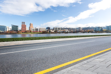 cityscape and skyline of portland from empty road