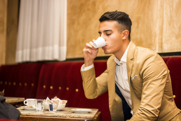 Handsome man in cafe